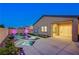 Stunning backyard showcasing a modern pool, spa, elegant lighting, and manicured landscaping at 8956 Skye Treeline St, Las Vegas, NV 89166