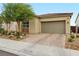 Charming single-story home with a well-maintained front yard and a spacious two-car garage at 8956 Skye Treeline St, Las Vegas, NV 89166