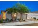 Charming home featuring well-maintained landscaping, a paved driveway, and an attached two-car garage at 8956 Skye Treeline St, Las Vegas, NV 89166