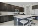 Well-equipped kitchen with stainless steel appliances, a functional island, and plenty of storage space at 8956 Skye Treeline St, Las Vegas, NV 89166