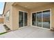 Back patio with sliding glass doors providing access to the outdoor pool at 8956 Skye Treeline St, Las Vegas, NV 89166