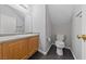 Half bathroom with a toilet and a sink at 9312 Straw Hays St # 103, Las Vegas, NV 89178