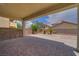 A backyard with patio, desert landscaping, and block wall at 9792 Crescent Lodge Ct, Las Vegas, NV 89178
