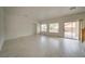 Spacious open living area, natural light, neutral paint and access to backyard at 9792 Crescent Lodge Ct, Las Vegas, NV 89178
