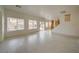 Open living area with backyard access, natural light, neutral paint and tile floors at 9792 Crescent Lodge Ct, Las Vegas, NV 89178