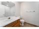 Bathroom with a white countertop, wood vanity, and tiled floors at 9962 Keephills St, Las Vegas, NV 89183