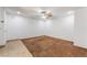 Spacious bedroom with neutral carpet, ample natural light, and a ceiling fan at 9962 Keephills St, Las Vegas, NV 89183