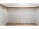 Walk-in closet with wood railings and neutral carpet at 9962 Keephills St, Las Vegas, NV 89183