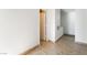 Open hallway featuring neutral tile flooring and modern wall finish at 9962 Keephills St, Las Vegas, NV 89183