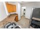 Efficient kitchen layout with stainless steel appliances and convenient access to laundry area at 9962 Keephills St, Las Vegas, NV 89183