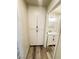 View of hall storage and updated bathroom with a new vanity and shower over tub at , Las Vegas, NV 89121