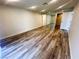 Bedroom features new wood-look flooring, neutral walls, and an extra large mirror at , Las Vegas, NV 89121