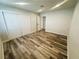 Bedroom features closet and new wood-look flooring; light and bright with neutral paint at , Las Vegas, NV 89121