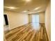 Bonus room with sliding glass doors providing access to yard and new wood-look floors at , Las Vegas, NV 89121