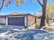 Exterior elevation shows a home with a two-car garage and desert landscaping at , Las Vegas, NV 89121