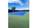 Exterior full shot of community tennis court with green and blue surface at , Las Vegas, NV 89121