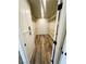 Spacious walk-in closet with ample shelving and storage space with stylish wood-look floors at , Las Vegas, NV 89121