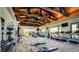 Spacious gym equipped with cardio machines, weights, and large windows showcasing scenic views at 10300 Stroma Ave, Las Vegas, NV 89166