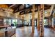 Inviting lounge area with comfortable seating, wooden beam architecture, and ample lighting at 10300 Stroma Ave, Las Vegas, NV 89166
