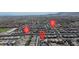 Aerial view of a neighborhood showcasing the community and nearby landmarks with street names at 10300 Stroma Ave, Las Vegas, NV 89166