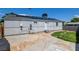 Backyard featuring solar panels and stone pavers, a blend of sustainability and style at 1123 Chapman Dr, Las Vegas, NV 89104