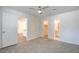 Cozy bedroom with plush carpet, natural light, and convenient access to the bathroom and closet at 1123 Chapman Dr, Las Vegas, NV 89104