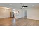 Bright living room featuring laminate flooring, recessed lighting, and neutral color palette at 1123 Chapman Dr, Las Vegas, NV 89104
