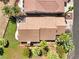 An aerial view shows the roof, desert landscaping and surrounding properties at 1131 Golf Club, Laughlin, NV 89029