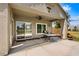 Inviting covered patio with ceiling fan and ample space for outdoor seating and dining at 1131 Golf Club, Laughlin, NV 89029