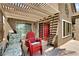 Relaxing covered patio with comfortable seating, perfect for enjoying the outdoors at 1131 Golf Club, Laughlin, NV 89029