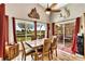 Elegant dining room featuring a wooden table, and natural light from the sliding glass door at 1131 Golf Club, Laughlin, NV 89029