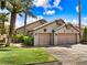 Charming home with a two-car garage and well-maintained landscaping in a beautiful neighborhood at 1131 Golf Club, Laughlin, NV 89029
