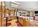 Spacious kitchen with light wood cabinets, stainless steel appliances, and a kitchen island at 1131 Golf Club, Laughlin, NV 89029