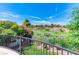 Backyard view of greenery from balcony, enhancing outdoor lifestyle appeal at 1235 Panini Dr, Henderson, NV 89052
