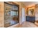 Bathroom featuring glass shower and soaking tub at 1235 Panini Dr, Henderson, NV 89052