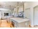 Kitchen features a spacious island, stainless steel appliances and an open layout at 1235 Panini Dr, Henderson, NV 89052