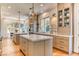 Gourmet kitchen with marble countertops, stainless steel appliances, and custom cabinetry at 1235 Panini Dr, Henderson, NV 89052