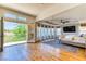 An airy bedroom with terrace access, a ceiling fan, and an area rug at 1235 Panini Dr, Henderson, NV 89052