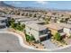 Two-story home boasts manicured landscaping and stone driveway in a well-maintained neighborhood with mountain views at 12426 Alpenglow Ct, Las Vegas, NV 89138