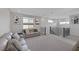 Spacious loft area with neutral tones, stylish decor, and plenty of natural light at 12426 Alpenglow Ct, Las Vegas, NV 89138