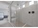 Modern glass shower with dual shower heads at 12426 Alpenglow Ct, Las Vegas, NV 89138