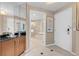 Elegant bathroom featuring a tub, sleek modern fixtures and seamless transition to room at 125 E Harmon Ave # 511, Las Vegas, NV 89109