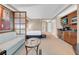 Relaxing bedroom featuring a cozy seating area, bed, and convenient kitchenette at 125 E Harmon Ave # 511, Las Vegas, NV 89109