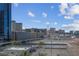 City view featuring a large parking lot surrounded by tall buildings at 125 E Harmon Ave # 511, Las Vegas, NV 89109