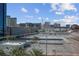 City view featuring a large parking lot surrounded by tall buildings at 125 E Harmon Ave # 511, Las Vegas, NV 89109