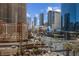 City view featuring street with cars, tall buildings and beautiful blue skies at 125 E Harmon Ave # 511, Las Vegas, NV 89109
