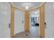 Bright entryway featuring neutral walls, white doors, tile floors, and a glimpse into the living space at 125 E Harmon Ave # 511, Las Vegas, NV 89109