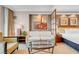 Living room with a modern sofa, coffee table, art, and a glimpse of the bedroom area at 125 E Harmon Ave # 511, Las Vegas, NV 89109