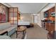 Comfortable suite featuring a sleeper sofa, desk, and kitchenette with modern finishes at 125 E Harmon Ave # 511, Las Vegas, NV 89109