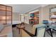 Comfortable suite featuring a sleeper sofa, desk, and kitchenette with modern finishes at 125 E Harmon Ave # 511, Las Vegas, NV 89109